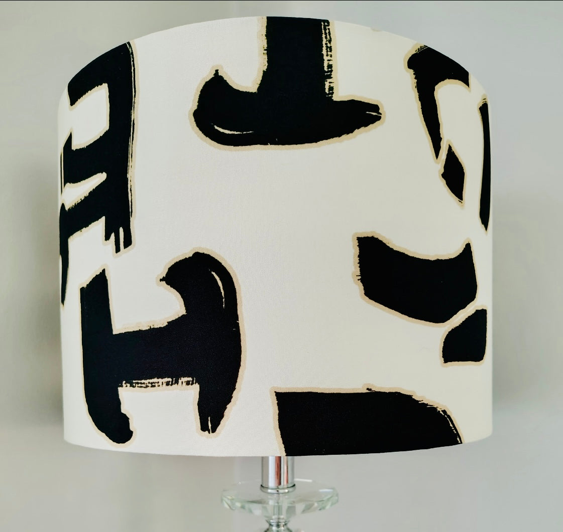 Lampshade with black abstract patterns on a white background