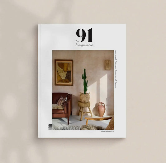 Magazine cover with a room interior design on a beige background