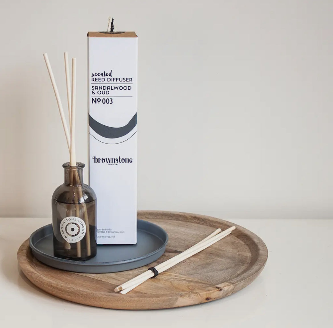 Brownstone London Diffuser with bottle and packaging on a wooden tray