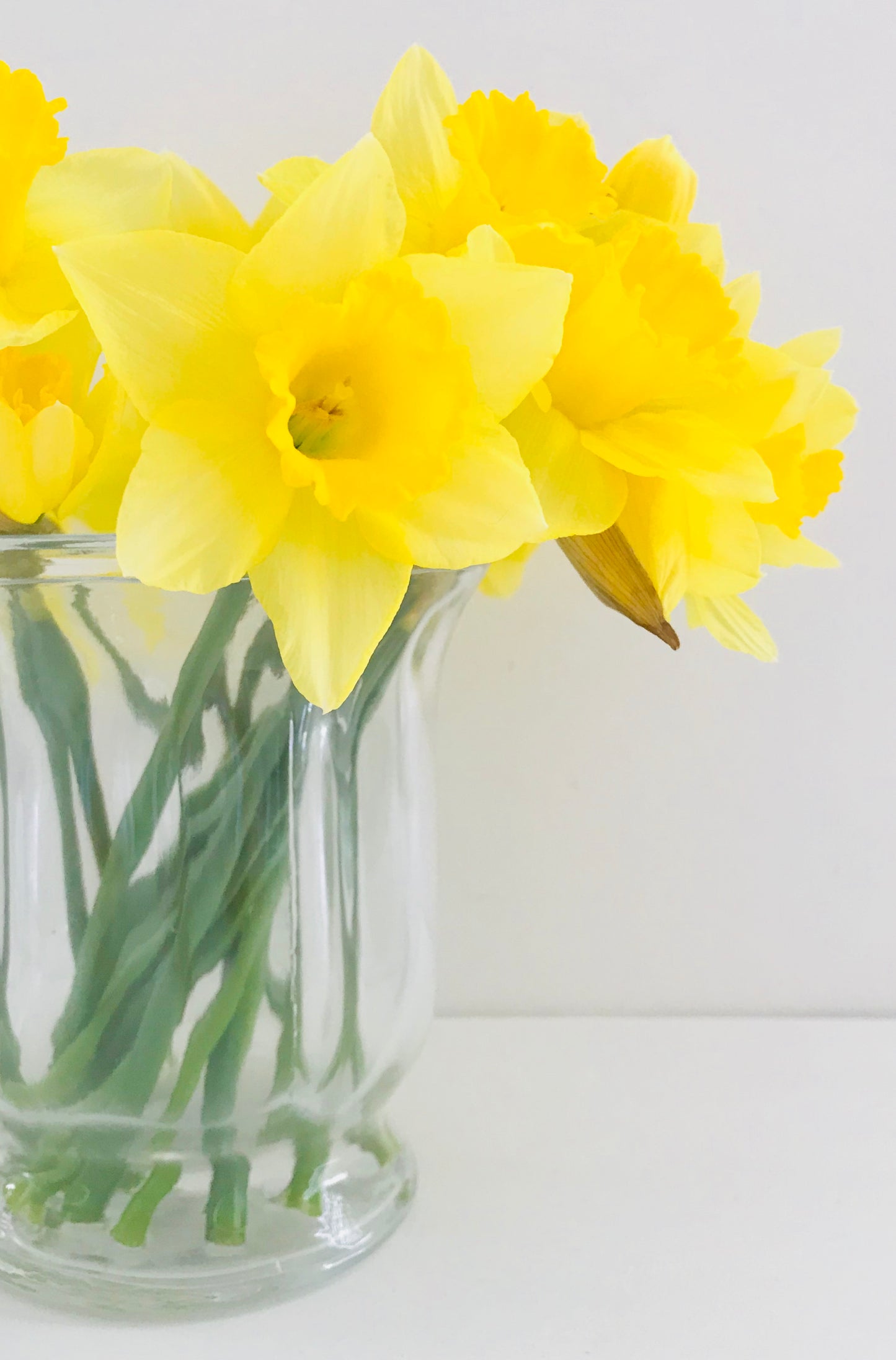 Fluted Hurricane Vase with flowers