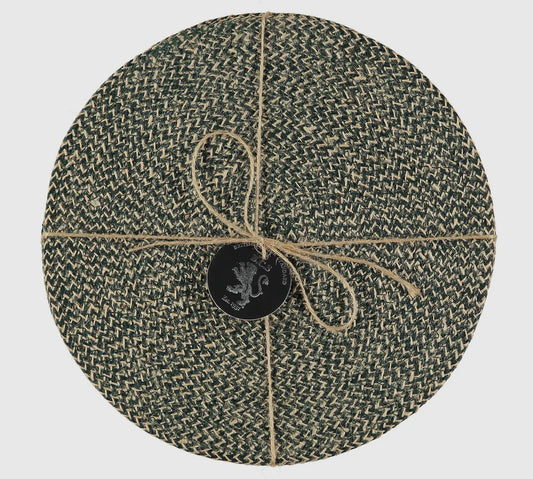 Round woven mat with a central logo on a light gray background