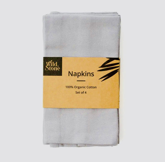 Packaged set of gray napkins with a 'Wild Stone' label on a white background