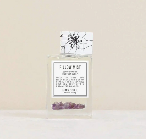 Pillow Mist - Deepest Sleep bottle with label on a beige background