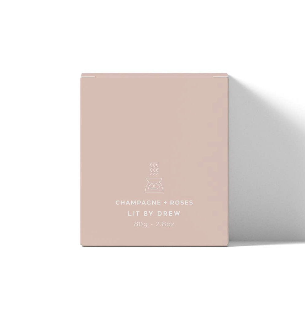 Beige box with 'Lit by Drew' branding on a white background