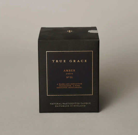 Black candle box with 'True Grace' branding on a gray background