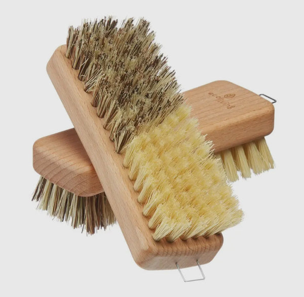 Wooden brush with natural bristles on a white background