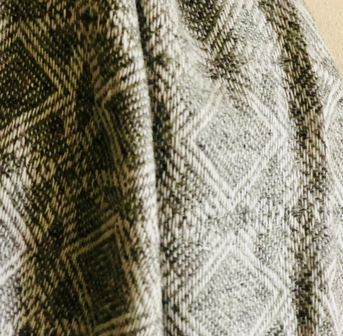 Close-up of a textured fabric with a geometric pattern